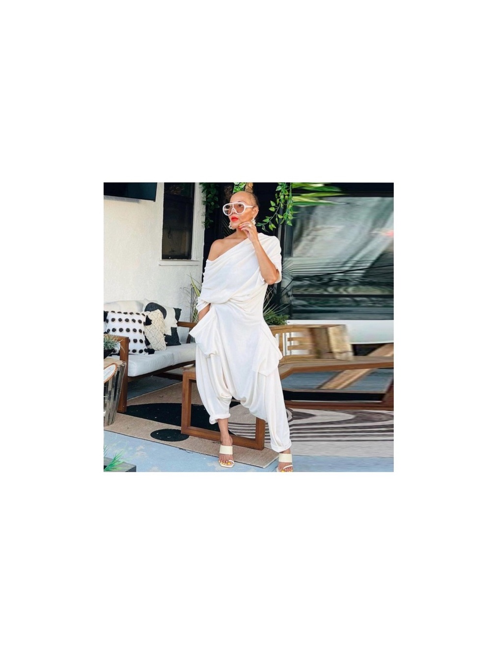 Draped One-Shoulder White Jumpsuit flawed.
